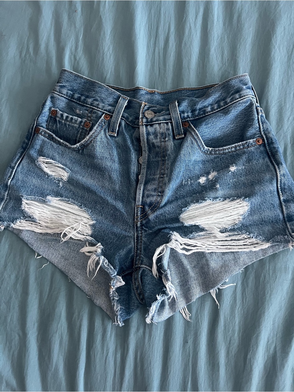 Levi 501 Distressed High-Waist Denim Shorts in Medium Blue